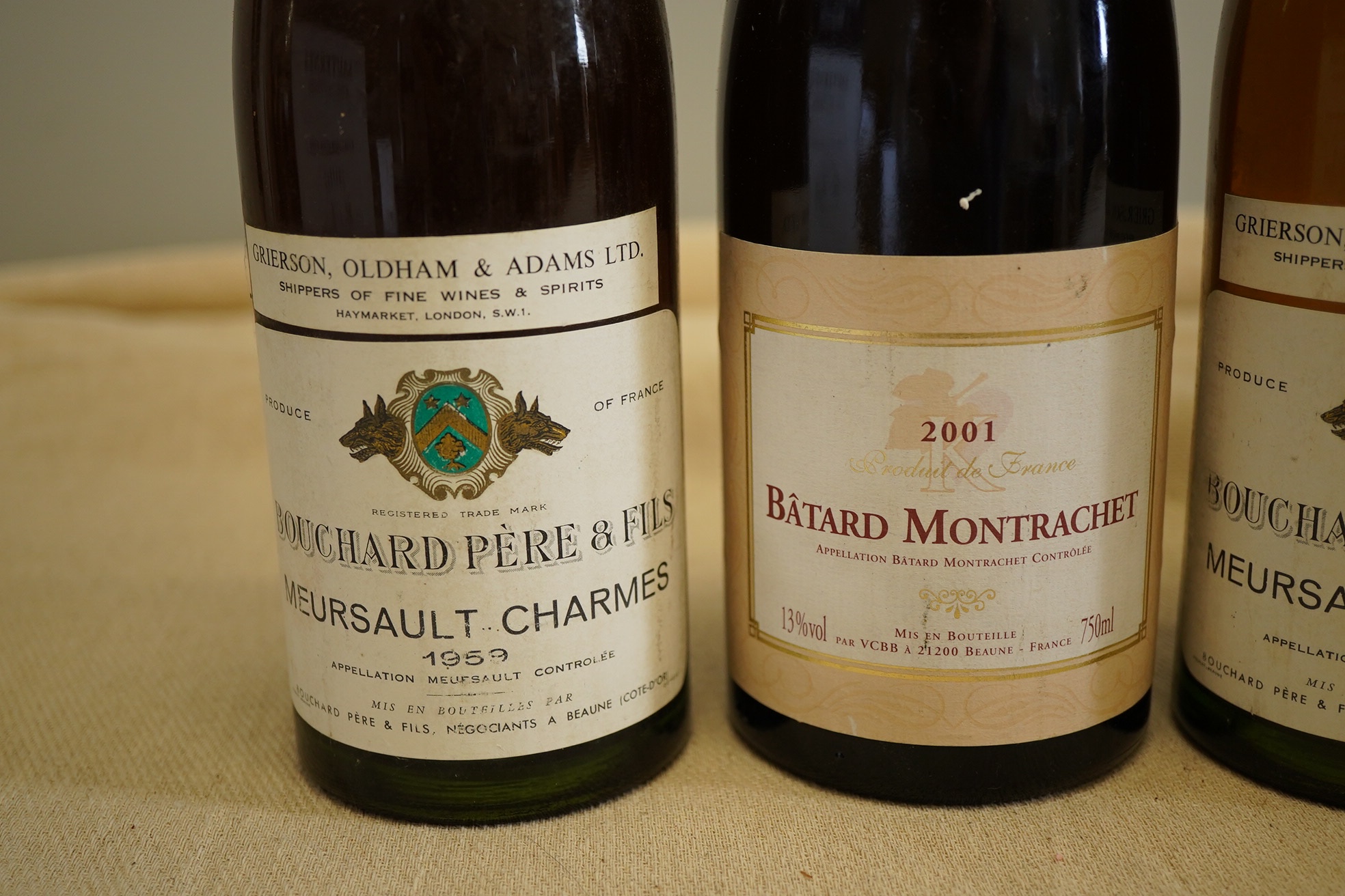 One bottle of 1985 Meursault 1er Cru, Antonin Rodet, one bottle of 2001 Batard Montrachet, two bottles of 1959 Meursault Charmes, Bouchard Pere & Fils and one half bottle of 1973 Chateau Filot, Sauternes. (5)